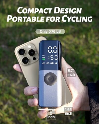 Hand holding a compact digital air pump next to a smartphone, with dimensions and weight displayed.
