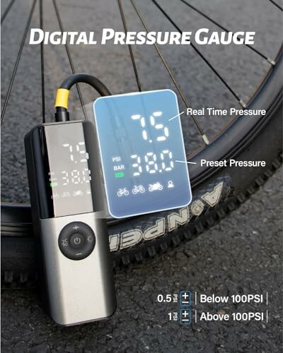 Digital pressure gauge displaying real-time and preset tire pressure on a bike.