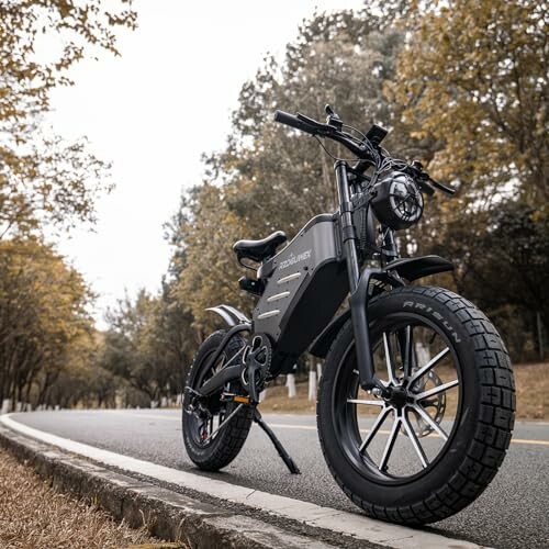 Electric bike parked on a road lined with trees